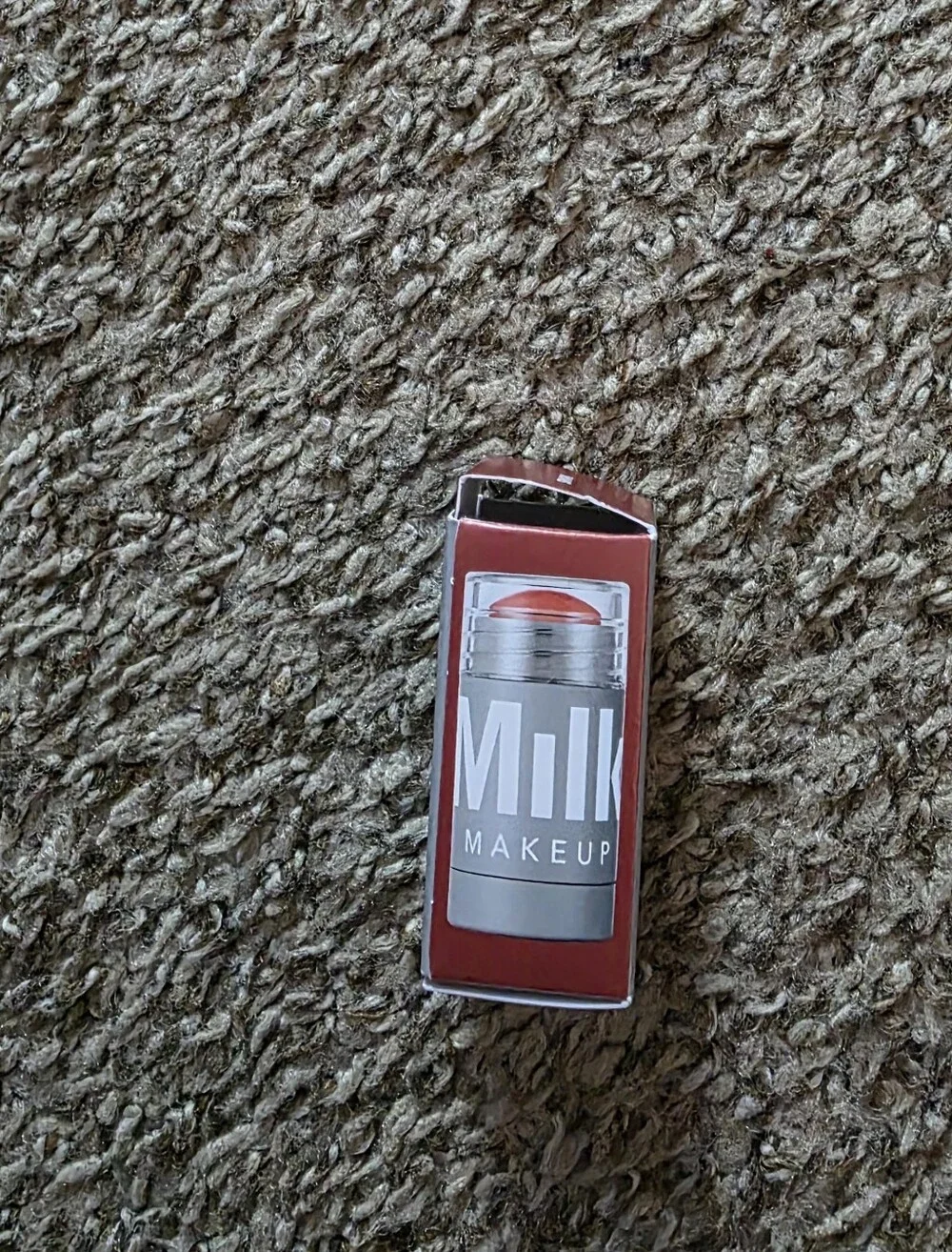 Milk Makeup Lipstick in Gray Box with Red Accent